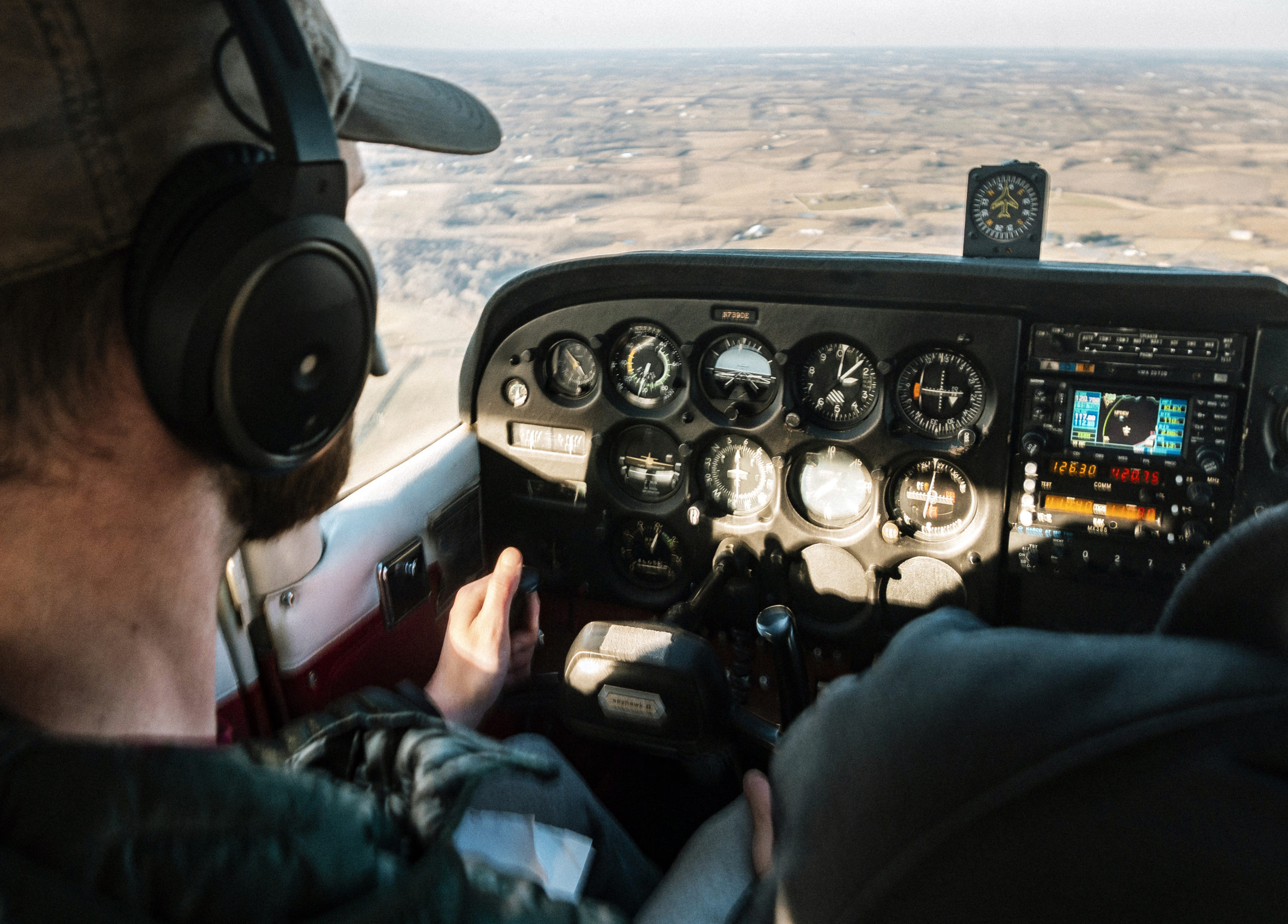 pilot-flying-aircraft-daytime (1)