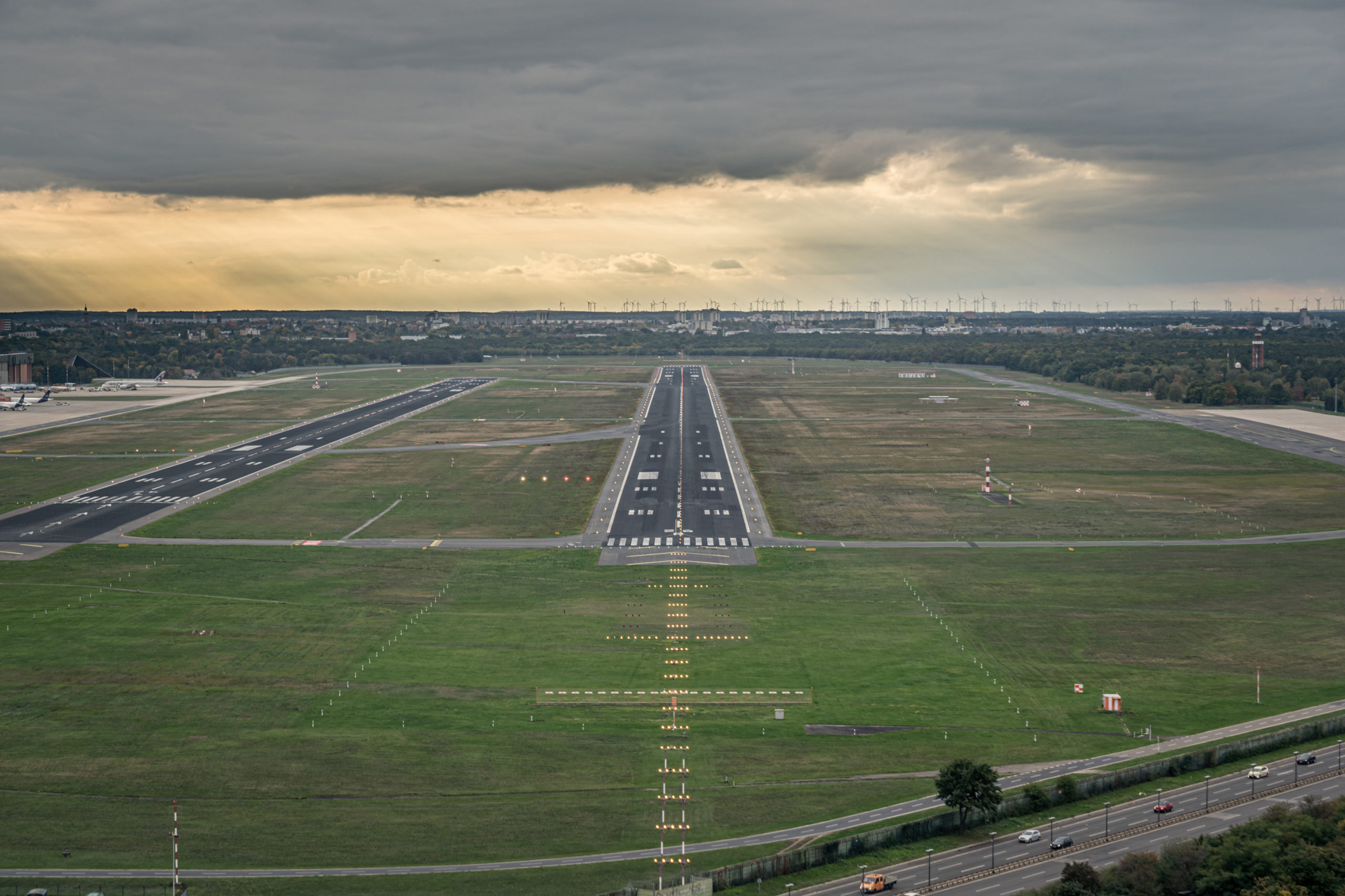 high-angle-view-airport-runway-against-sky